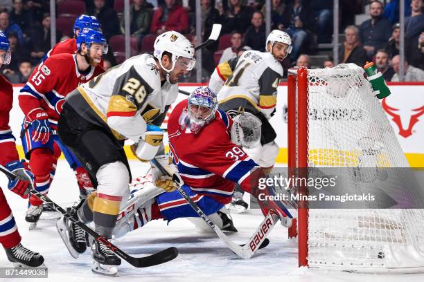 Pierre-Edouard Bellemare of the Vegas Golden Knights scores on goaltender Charlie Lindgren of the Montreal Canadiens in the first period during the...