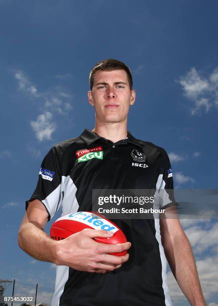 Recently re-signed ruckman/forward Mason Cox of the Magpies AFL team poses during a combined Collingwood Magpies AFL and Super Netball media session...