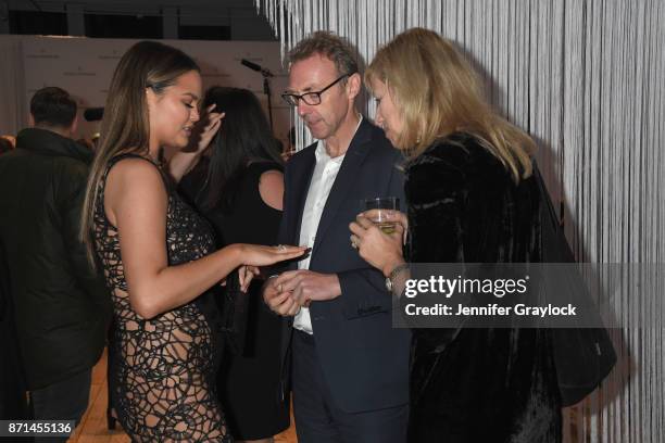 Chrissy Teigen and Forevermark President Charles Stanley attend the Forevermark Tribute event on November 7, 2017 in New York City.