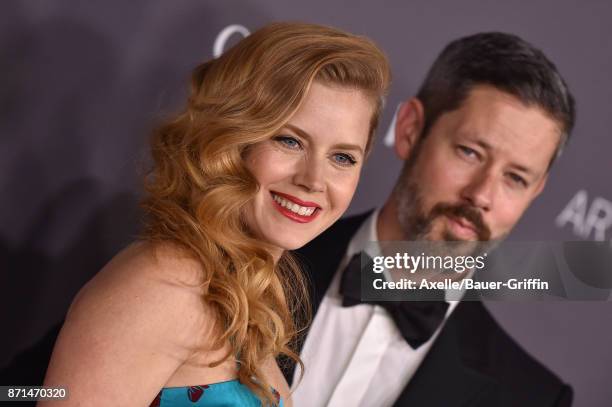 Actors Amy Adams and Darren Le Gallo arrive at the 2017 LACMA Art + Film Gala at LACMA on November 4, 2017 in Los Angeles, California.