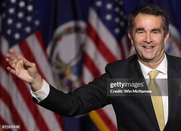 Ralph Northam, the Democratic candidate for governor of Virginia, greets supporters at an election night rally November 7, 2017 in Fairfax, Virginia....