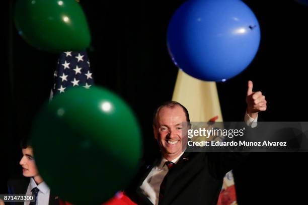 The new Democratic governor of New Jersey Phil Murphy celebrates his victory on November 7, 2017 in Asbury Park, New Jersey. Murphy was projected an...