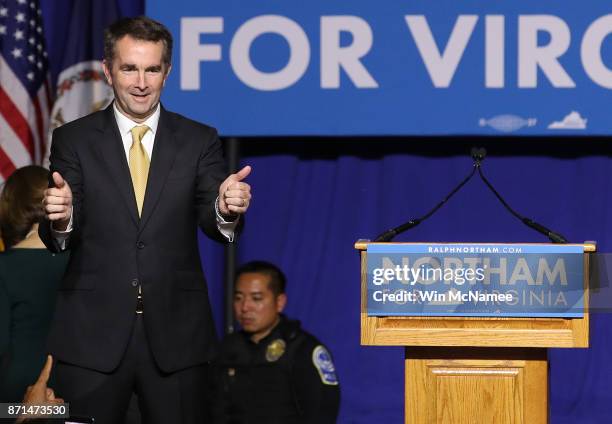 Virginia Gov.-elect Ralph Northam greets supporters at an election night rally November 7, 2017 in Fairfax, Virginia. Northam defeated Republican...