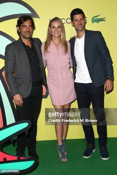 Global CEO Thierry Guibert , Gwyneth Paltrow and Novak Djokovic attend the celebration of the re-opening of the LACOSTE Rodeo Drive Boutique at...