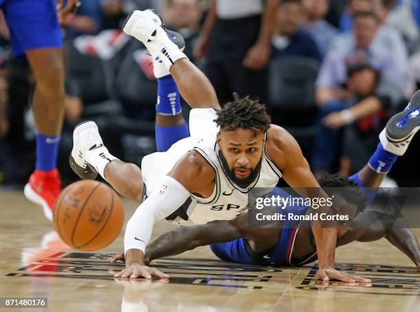 Patty Mills of the San Antonio Spurs steals the ball from Patrick Beverley of the Los Angeles Clippers at AT&T Center on November 7, 2017 in San...