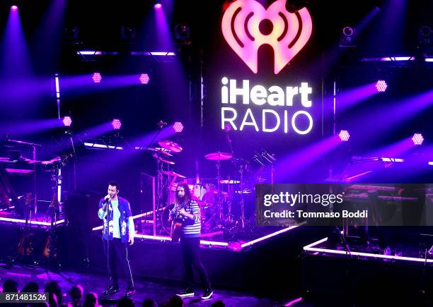 Adam Levine and James Valentine of Maroon 5 perform at the iHeartRadio Album Release Party with Maroon 5 at iHeartRadio Theater on November 7, 2017...