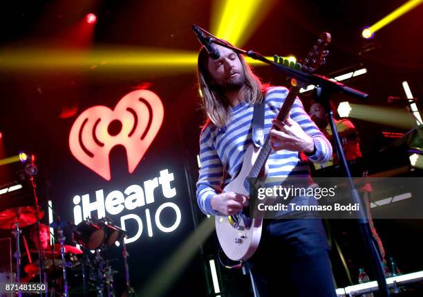 James Valentine of Maroon 5 performs at the iHeartRadio Album Release Party with Maroon 5 at iHeartRadio Theater on November 7, 2017 in Burbank,...