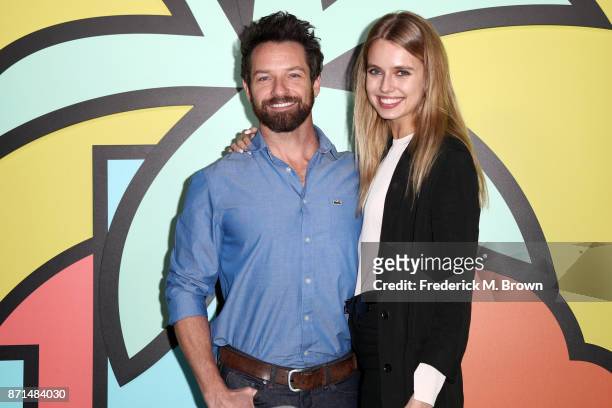 Ian Bohen and guest attend the celebration of the re-opening of the LACOSTE Rodeo Drive Boutique at Sheats Goldstein Residence on November 7, 2017 in...