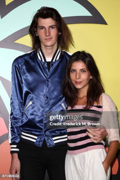 Dylan Brosnan and guest attend the celebration of the re-opening of the LACOSTE Rodeo Drive Boutique at Sheats Goldstein Residence on November 7,...