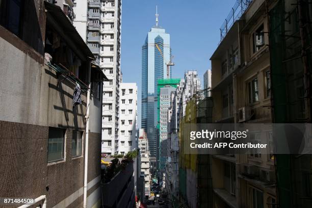This picture taken on October 27, 2017 shows a general view of The Center office building in Hong Kong. Chinese investors' penchant for Hong Kong...