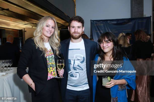 Erin Becker, Greg James and Rachel Silverman during A Blade of Grass Annual Night of Alchemy on November 7, 2017 in New York City.