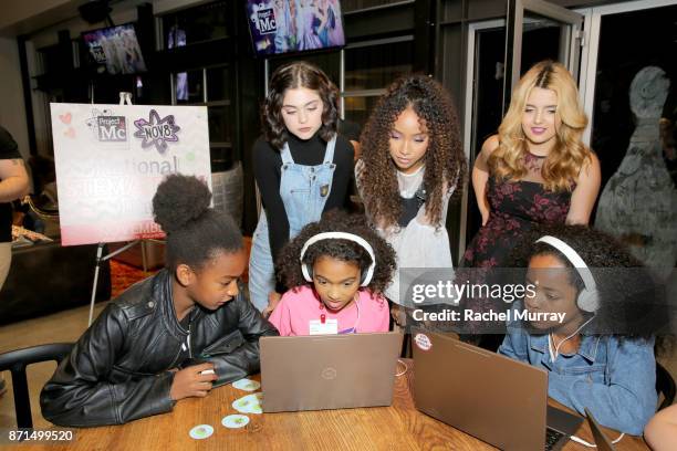 Project Mc2 Mika Abdalla, Victoria Vida, and Genneya Walton participate with girls coding Google's CS First activity during MGA Entertainment, Cast...