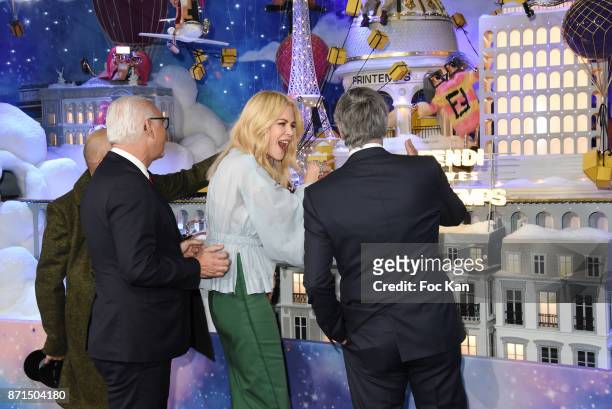 Printemps CEO Paolo Cesare, actress Nicole Kidman and general director LVMH Antonio Belloni attend the 'Le Printemps' Christmas Decorations...