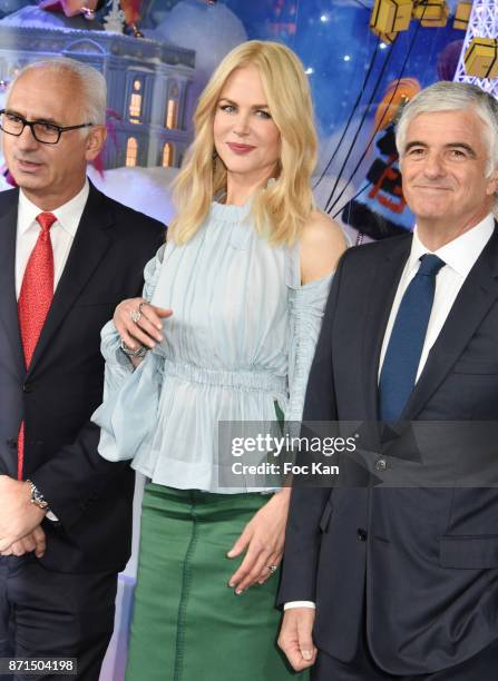 Printemps CEO Paolo Cesare, actress Nicole Kidman and general director LVMH Antonio Belloni attend the 'Le Printemps' Christmas Decorations...