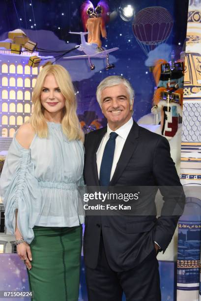 Actress Nicole Kidman and general director LVMH Antonio Belloni attend the 'Le Printemps' Christmas Decorations inauguration at Le Printemps on...