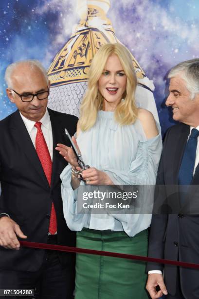 Printemps CEO Paolo Cesare, actress Nicole Kidman and general director LVMH Antonio Belloni attend the 'Le Printemps' Christmas Decorations...