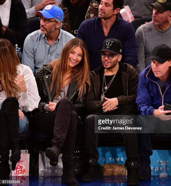 Richie Akiva and guest attend the Charlotte Hornets Vs New York Knicks game at Madison Square Garden on November 7, 2017 in New York City.