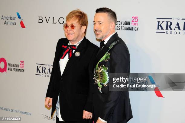 Elton John and David Furnish attend the Elton John AIDS Foundation Commemorates Its 25th Year And Honors Founder Sir Elton John During New York Fall...