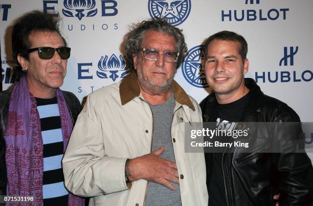 Musician Slim Jim Phantom of The Stray Cats, artist Shepard Fairey and musician Steve Jones of The Sex Pistols attend photo opp for Hulu's 'Obey...