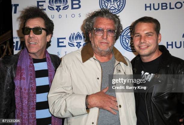 Musician Slim Jim Phantom of The Stray Cats, artist Shepard Fairey and musician Steve Jones of The Sex Pistols attend photo opp for Hulu's 'Obey...