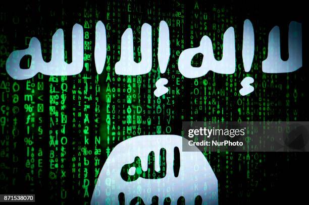 The ISIS logo is seen on a computer screen in this photo illustration on November 8, 2017.