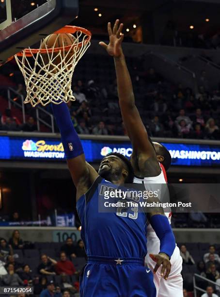 Dallas Mavericks guard Wesley Matthews beats Washington Wizards guard John Wall to the basket during the game between the Washington Wizards and the...