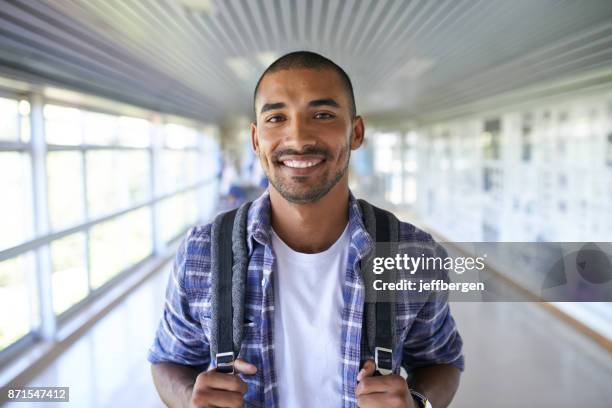 here to secure my future - hispanic man portrait imagens e fotografias de stock