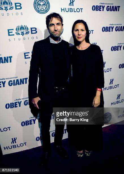 Musician Andrew Bird and wife Katherine Tsina attend photo opp for Hulu's 'Obey Giant' at The Theatre at Ace Hotel on November 7, 2017 in Los...