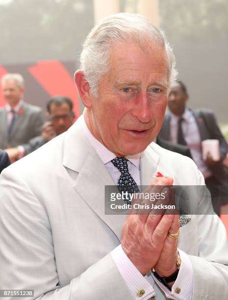 Prince Charles, Prince of Wales performs the Namaste gesture as he attends a celebration of the UK-India Year of Culture hosted at the British...