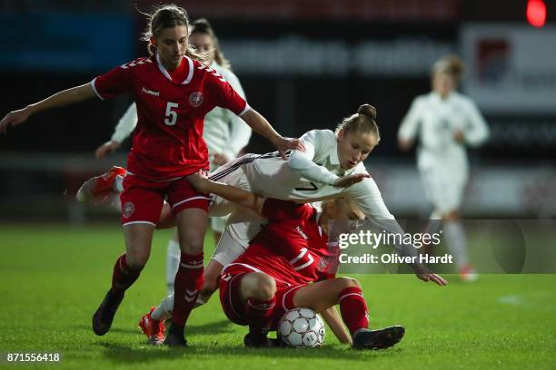 Nicole Woldmann of Germany and Sofie Lundgaard of Denmark compete for the ball during the U16 Girls international friendly match betwwen Denmark and...