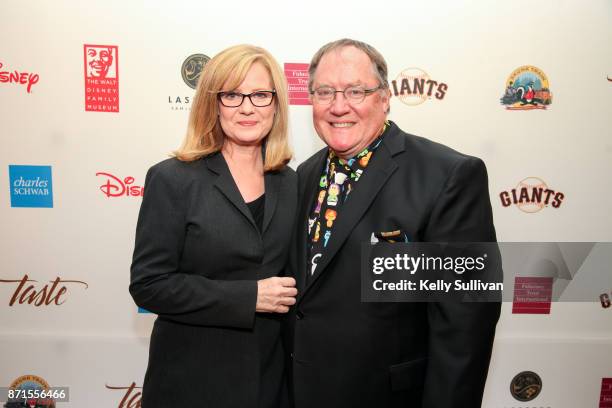 Bonnie Hunt and John Lasseter pose for photos on the red carpet during The Walt Disney Family Museum's 3rd Annual Fundraising Gala at the Golden Gate...