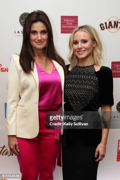 Idina Menzel and Kristen Bell pose for photos on the red carpet during The Walt Disney Family Museum's 3rd Annual Fundraising Gala at the Golden Gate...