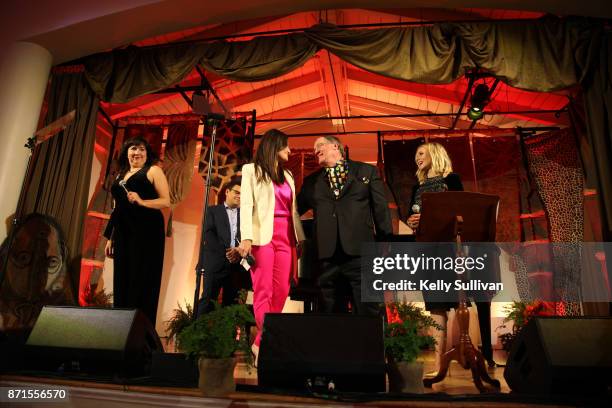 Kristen Anderson-Lopez, Bobby Lopez, Idina Menzel and Kristen Bell perform "You've Got a Friend In Me" onstage with John Lasseter, recipient of the...