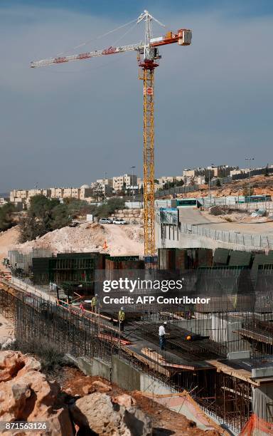 Picture taken on November 8, 2017 shows a general view of construction work in Ramat Shlomo, a Jewish settlement in the mainly Palestinian eastern...