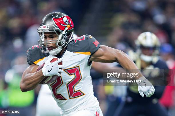 Doug Martin of the Tampa Bay Buccaneers runs the ball during a game against the New Orleans Saints at Mercedes-Benz Superdome on November 5, 2017 in...