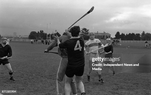 View of a GAA hurling match between St Vincents and St Marks at St Vincents Park, Dublin, circa October 1989. .