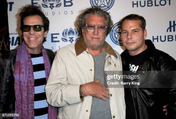 Musician Slim Jim Phantom of The Stray Cats, musician Steve Jones of The Sex Pistols and artist Shepard Fairey attend photo opp for Hulu's 'Obey...