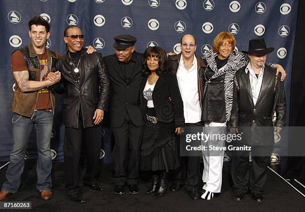 Devin Lima with Larry Graham, Fred Stewart, Rose Stewart, and Gregg Errico Cynthia Robinson, and Jerry Martini of Sly and the Family Stone