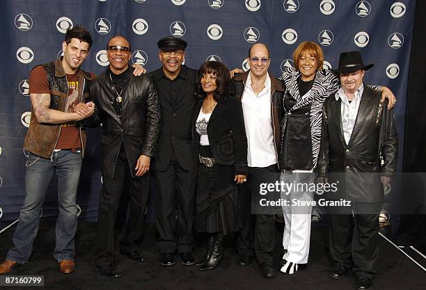 Devin Lima with Larry Graham, Fred Stewart, Rose Stewart, and Gregg Errico Cynthia Robinson, and Jerry Martini of Sly and the Family Stone