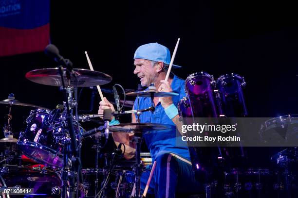 Chad Smith of Red Hot Chili Peppers as they perform on stage during the 11th Annual Stand Up for Heroes at The Theater at Madison Square Garden on...