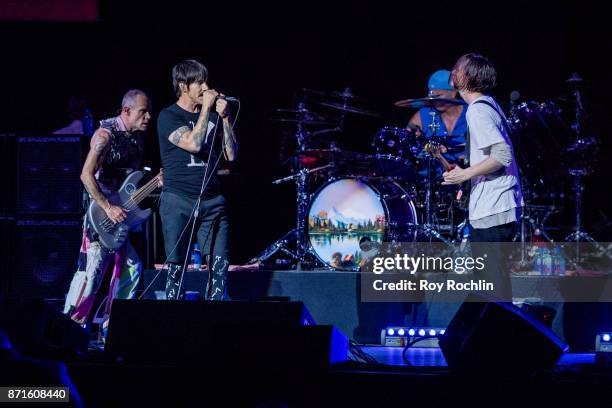 Members of Red Hot Chili Peppers Flea, Anthony Kiedis, Chad Smith and Josh Klinghoffer as they perform on stage during the 11th Annual Stand Up for...