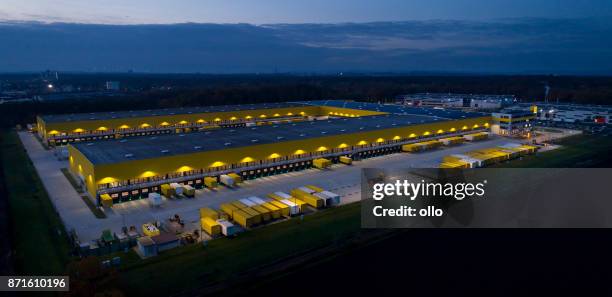 large distribution hub, trucks and trailers - warehouse exterior stock pictures, royalty-free photos & images