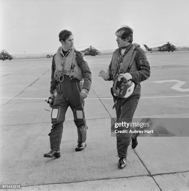 Prince Charles with a collegue during his time with the 845 Naval Air Squadron, 8th January 1975.