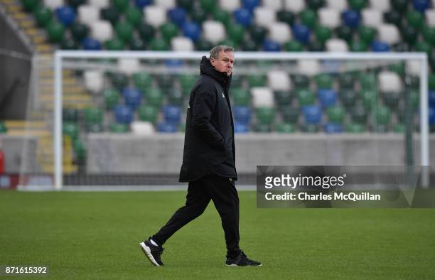 Northern Ireland manager Michael O'Neill watches on during the squad training session at Windsor Park on November 8, 2017 in Belfast, Northern...
