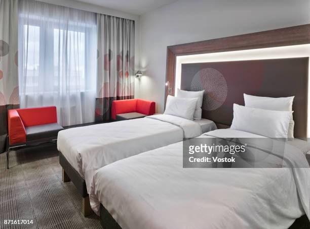 hotel room in the new hotel complex in moscow - eenpersoonsbed stockfoto's en -beelden