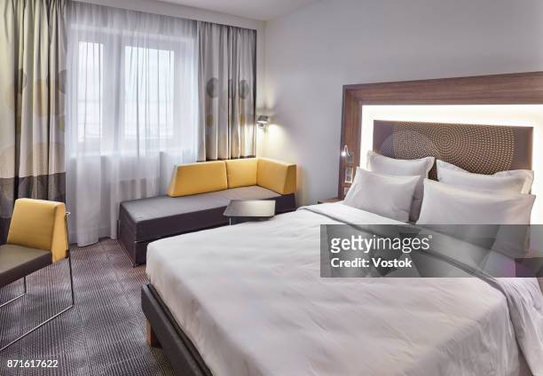 hotel room in the new hotel complex in moscow - hotelsuite stockfoto's en -beelden