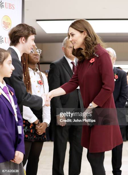 Catherine, Duchess Of Cambridge meets pupils from The Bridge Academy at the annual Place2Be School Leaders Forum at UBS London on November 8, 2017 in...