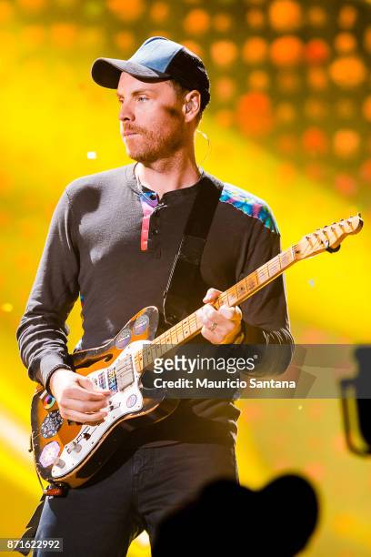 Jonny Buckland guitarist member of the band Coldplay performs live on stage at Allianz Parque on November 7, 2017 in Sao Paulo, Brazil.