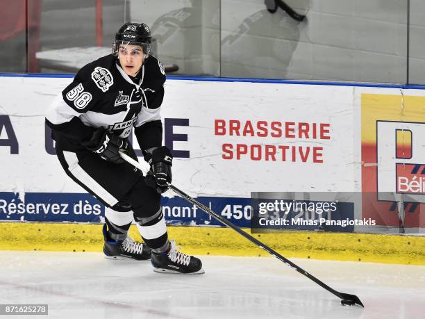 Samuel Bolduc of the Blainville-Boisbriand Armada skates the puck against the Gatineau Olympiques during the QMJHL game at Centre d'Excellence Sports...