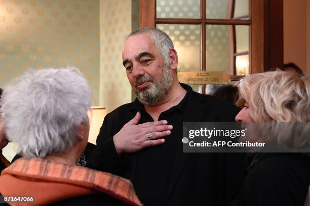 French writer Philippe Jaenada is pictured after he was awarded the Femina literary prize on November 8, 2017 in Paris, for his book entitled "La...